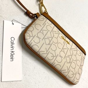 Calvin Klein Signature Coated Canvas Wristlet brand new with original ta…